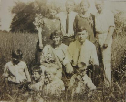 Helen On Alec and Angeline's farm. Cousins: Jimmie, Robert, Gladys, Pris. Who are the other adults? Michigan circa 1928