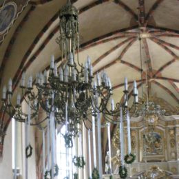 Corpus Christi wreaths hanging in Lekno church